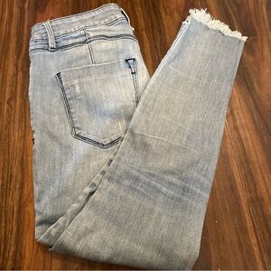 Bebe distressed skinny jeans light wash